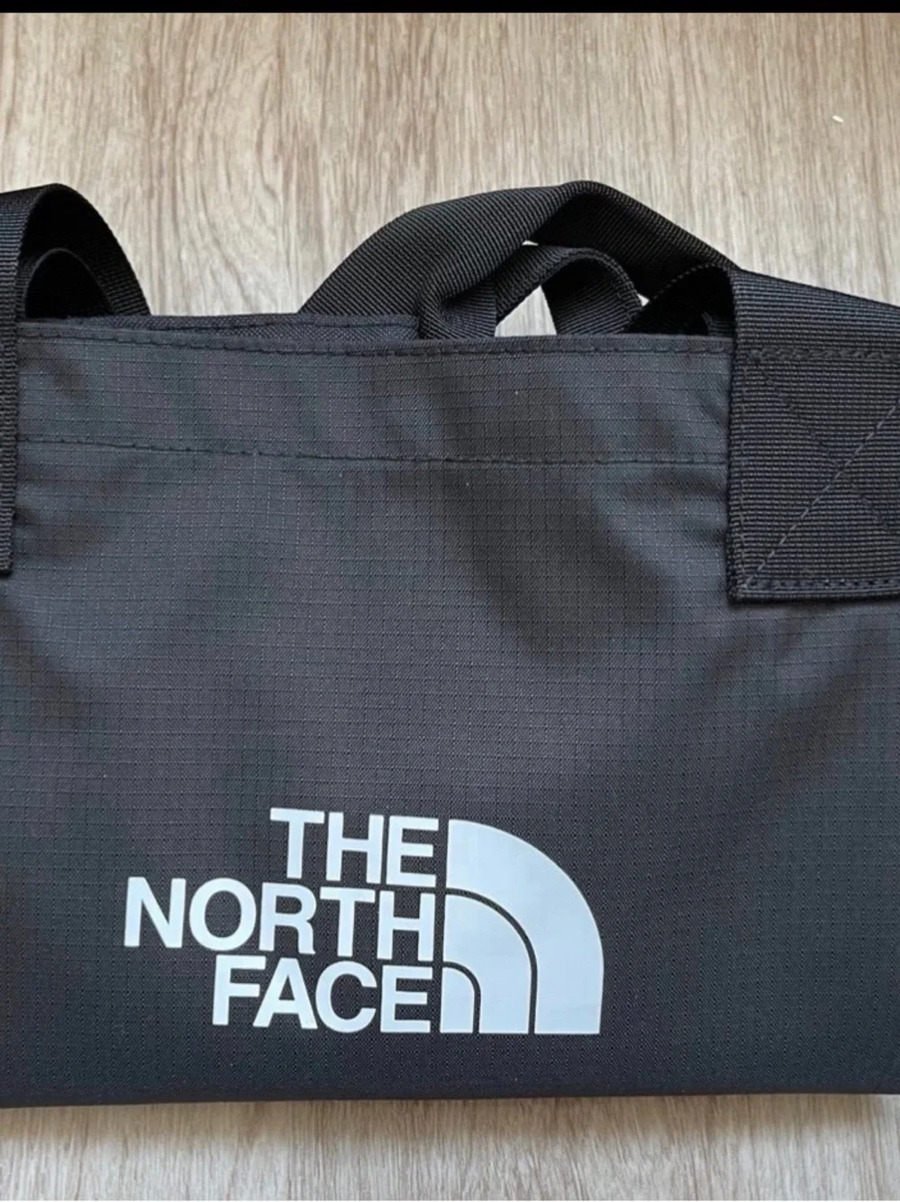 The North Face EWC SmallTote Bag. New, with tags. 100% Polyester. Color- Black